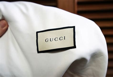 gucci logo fake|authentic gucci tag.